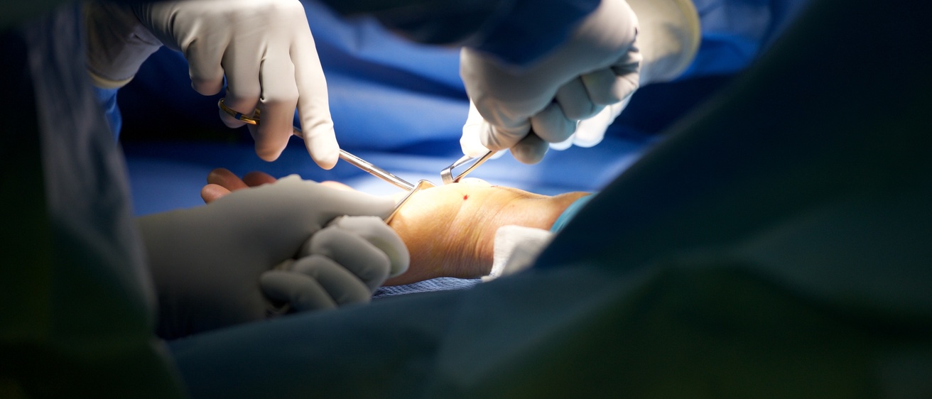 Operating Room at UIHC on Monday, May 7, 2018. Dr. Joseph Buckwalter V operates on a hand on May 7, 2018.